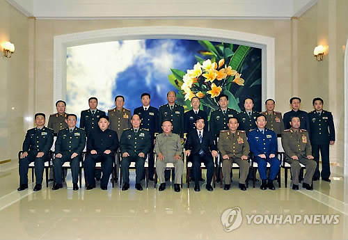 Li Jinai and PLA with Kim Family Nov 2011