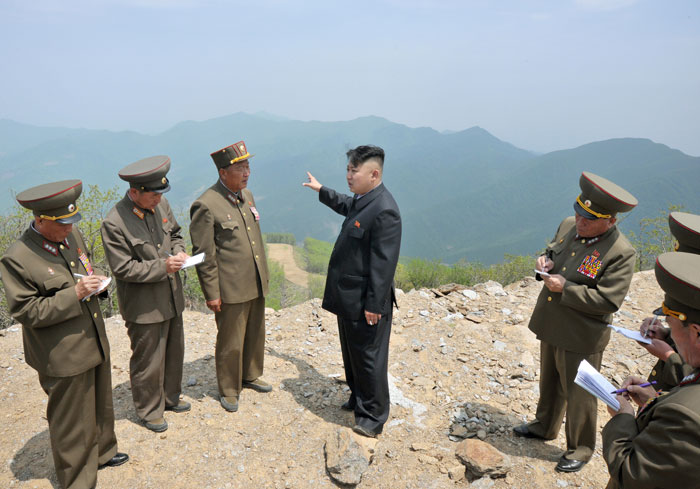 Kim doling out onsite guidance at Masik Pass Ski Resort construction site | image Rodong Sinmun, May 27, 2013
