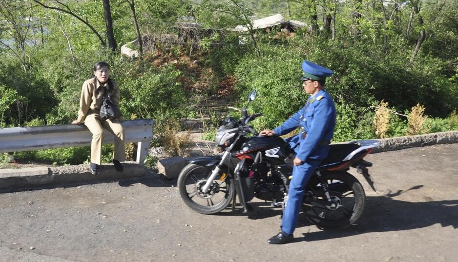 A "Honda" motorcycle (probably not a real Honda) in North Korea; the appearance of these bikes is a relatively new phenomenon in North Korea. | Image: Stephanie Kleine-Ahlbrandt